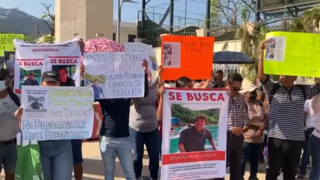Familiares de marineros que cuidaban yates marchan en Acapulco; exigen hallarlos